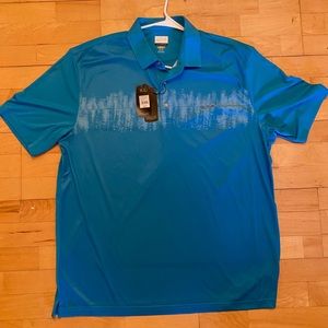 Brand new Greg Norman polo. Size XL.